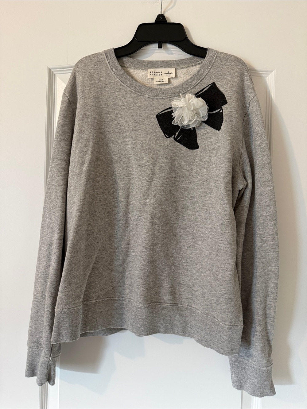 kate spade Gray Sweatshirt with Black Bow and White Flower Accent